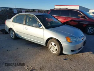2003 Honda Civic Hybrid with VIN JHMES956X3S019115, listed as a IAAI auction lot 41214960 with 303,472 mi miles. Bid and sale history available at carsss.com. Image 1.