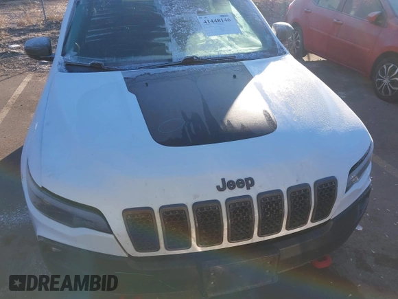 2019 Jeep Cherokee Trailhawk with VIN 1C4PJMBX8KD313712, listed as a IAAI auction lot 41448146 with 96,293 mi miles and . Bid and sale history available at DreamBid. Image 11.