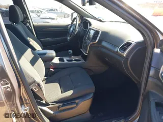 2014 Jeep Grand Cherokee Laredo with VIN 1C4RJEAG4EC317072, listed as a IAAI auction lot 41476862 with 127,742 mi miles. Bid and sale history available at carsss.com. Image 5.