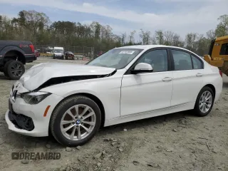 2017 BMW 3 Series 320i xDrive with VIN WBA8E5G5XHNU22436, listed as a Copart auction lot 52702805 with 74,008 mi miles and Salvage title. Bid and sale history available at DreamBid. Image 1.
