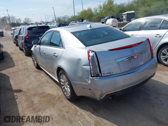 2011 Cadillac CTS Sedan Luxury with VIN 1G6DG5EY5B0165976, listed as a IAAI auction lot 42088157 with 151,004 mi miles. Bid and sale history available at carsss.com. Image 3.