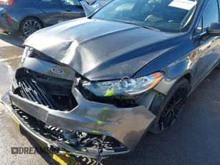 2018 Ford Fusion SE z VIN 3FA6P0H70JR191384, wystawiony jako IAAI lot #41340319 z przebiegiem 89 581 mil mil oraz . Historia ofert i sprzedaży dostępna na DreamBid. Obrazek 18.