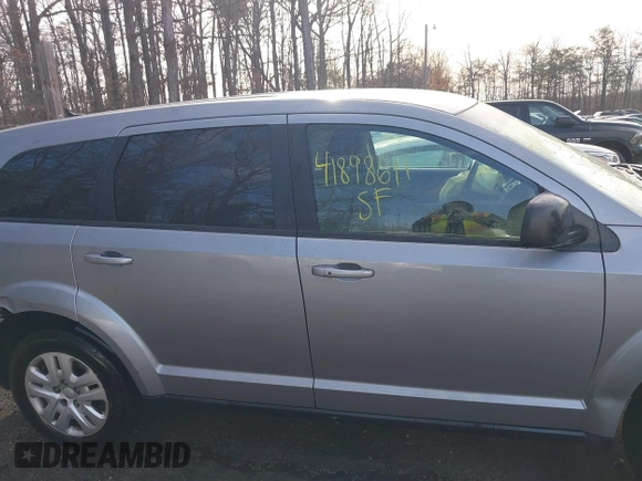 2015 Dodge Journey SE z VIN 3C4PDCAB3FT641675, wystawiony jako IAAI lot #41898611 z przebiegiem 218 121 mil mil oraz . Historia ofert i sprzedaży dostępna na DreamBid. Obrazek 14.