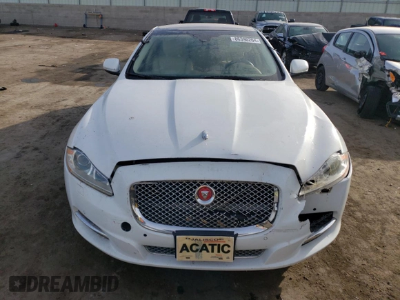 2014 Jaguar XJ with VIN SAJWA2GZ7E8V69543, listed as a Copart auction lot 86390204 with 110,929 mi miles and Salvage Title. Bid and sale history available at carsss.com. Image 5.