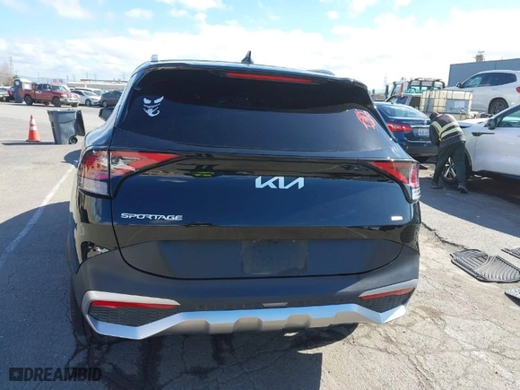2023 Kia Sportage Hybrid EX with VIN KNDPVCAG5P7017620, listed as a IAAI auction lot 41709782 with 85,720 mi miles. Bid and sale history available at carsss.com. Image 16.