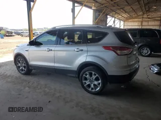 2015 Ford Escape Titanium with VIN 1FMCU9J96FUB33670, listed as a Copart auction lot 61826915 with 179,794 mi miles and Salvage title. Bid and sale history available at DreamBid. Image 2.