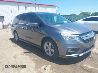2018 Honda Odyssey EX-L z VIN 5FNRL6H7XJB099531, wystawiony jako IAAI lot #42205624 z przebiegiem 136 587 mil mil oraz . Historia ofert i sprzedaży dostępna na DreamBid. Obrazek 1.