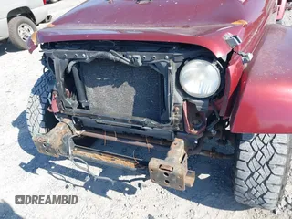 2007 Jeep Wrangler Unlimited Sahara с VIN 1J8GA59187L211825, выставлен на аукционе IAAI как лот 42313099 с пробегом 107 554 миль миль и . История ставок и продаж доступна на DreamBid. Изображение 6.