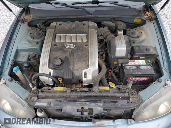 2003 Hyundai XG z VIN KMHFU45E03A262296, wystawiony jako Copart lot #67608394 z przebiegiem 116 296 mil mil oraz Szkoda całkowita • Salvage title. Historia ofert i sprzedaży dostępna na DreamBid. Obrazek 11.