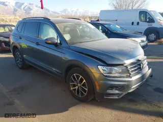 2020 Volkswagen Tiguan SE with VIN 3VV2B7AX9LM151977, listed as a IAAI auction lot 41448053 with 69,194 mi miles. Bid and sale history available at carsss.com. Image 1.