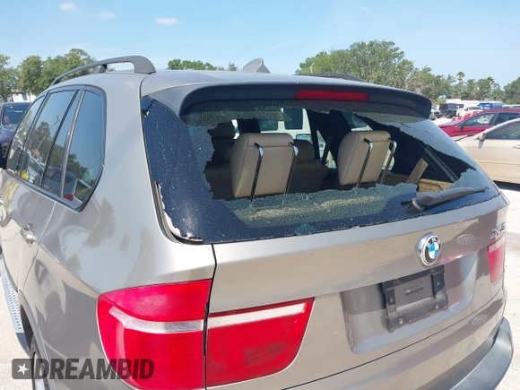 2008 BMW X5 3.0si with VIN 5UXFE43568L024029, listed as a IAAI auction lot 42107247 with 135,607 mi miles. Bid and sale history available at carsss.com. Image 12.