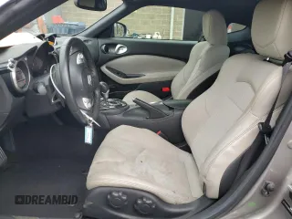 2009 Nissan 370Z Touring with VIN JN1AZ44E69M404789, listed as a Copart auction lot 62015094 with 56,447 mi miles and Salvage Title. Bid and sale history available at carsss.com. Image 7.