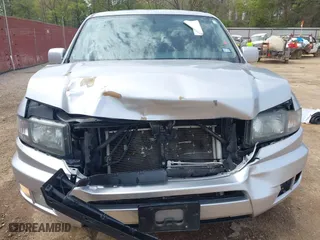 2014 Honda Ridgeline SE with VIN 5FPYK1F62EB013329, listed as a IAAI auction lot 41876728 with 127,014 mi miles. Bid and sale history available at carsss.com. Image 6.