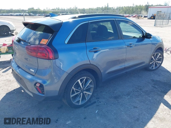 2021 Kia Niro Touring with VIN KNDCC3LC3M5483455, listed as a IAAI auction lot 41678795 with 132,216 mi miles. Bid and sale history available at carsss.com. Image 4.