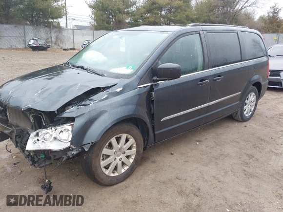 2014 Chrysler Town & Country Touring with VIN 2C4RC1BG6ER348090, listed as a IAAI auction lot 41687678 with 140,192 mi miles. Bid and sale history available at carsss.com. Image 17.