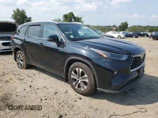 2022 Toyota Highlander XLE with VIN 5TDGZRBH6NS567328, listed as a Copart auction lot 66147185 with 205,654 mi miles and Clean title. Bid and sale history available at DreamBid. Image 4.