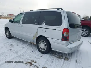 2002 Chevrolet Venture Warner Bros 1SE Pkg with VIN 1GNDX13E82D311155, listed as a IAAI auction lot 41622674 with 196,101 mi miles. Bid and sale history available at carsss.com. Image 3.