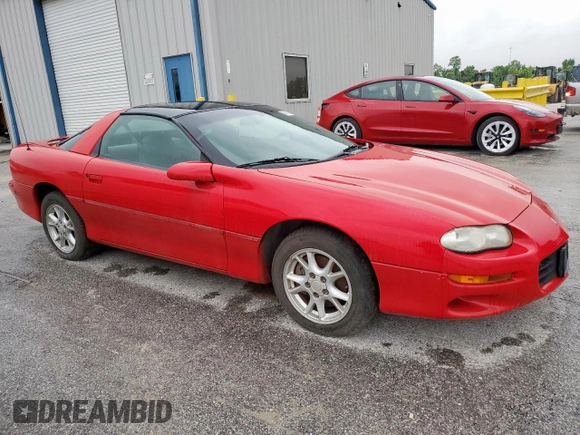 2002 Chevrolet Camaro z VIN 2G1FP22K322135404, wystawiony jako Copart lot #58767305 z przebiegiem Nie podano mil oraz Czysty tytuł • Clean title. Historia ofert i sprzedaży dostępna na DreamBid. Obrazek 4.