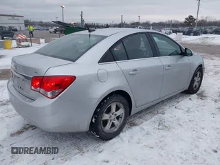 2014 Chevrolet Cruze 1LT z VIN 1G1PC5SB3E7224548, wystawiony jako IAAI lot #41318399 z przebiegiem 185 087 mil mil oraz . Historia ofert i sprzedaży dostępna na DreamBid. Obrazek 4.