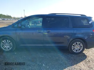 2014 Toyota Sienna XLE with VIN 5TDYK3DC2ES431320, listed as a IAAI auction lot 41977059 with 158,711 mi miles and . Bid and sale history available at DreamBid. Image 14.