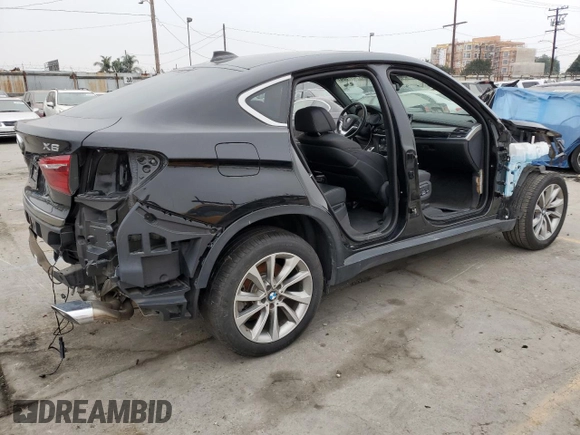 2019 BMW X6 xDrive50i with VIN 5UXKU6C52KLP60521, listed as a Copart auction lot 76317864 with 15,243 mi miles and Clean Title. Bid and sale history available at carsss.com. Image 3.
