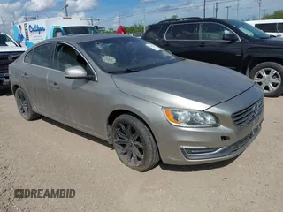 2015 Volvo S60 T5 Drive-E Platinum with VIN YV140MFD5F2318075, listed as a IAAI auction lot 42581282 with 133,346 mi miles and . Bid and sale history available at DreamBid. Image 1.