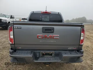 2021 GMC Canyon 4WD AT4 w/Cloth with VIN 1GTG6FEN8M1115918, listed as a Copart auction lot 80592964 with 59,888 mi miles and Salvage Title. Bid and sale history available at carsss.com. Image 6.