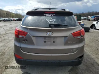 2011 Hyundai Tucson Limited with VIN KM8JUCAC2BU200517, listed as a Copart auction lot 53252005 with 158,502 mi miles and Salvage Title. Bid and sale history available at DreamBid. Image 6.