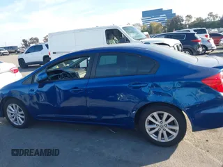 2012 Honda Civic EX with VIN 2HGFB2F88CH512765, listed as a IAAI auction lot 41591583 with 147,261 mi miles and . Bid and sale history available at DreamBid. Image 14.