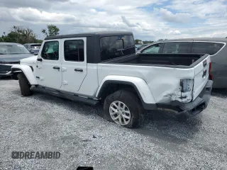 2023 Jeep Gladiator Freedom z VIN 1C6HJTAG6PL535119, wystawiony jako Copart lot #56870905 z przebiegiem 23 707 mil mil oraz Szkoda całkowita • Salvage title. Historia ofert i sprzedaży dostępna na DreamBid. Obrazek 2.