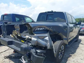 2024 Nissan Titan Pro-4X with VIN 1N6AA1ED8RN114313, listed as a IAAI auction lot 42498591 with 21,955 mi miles and . Bid and sale history available at DreamBid. Image 4.