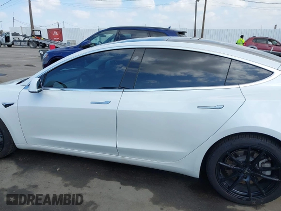 2020 Tesla Model 3 Long Range with VIN 5YJ3E1EB9LF795246, listed as a IAAI auction lot 41895750 with 163,061 mi miles and . Bid and sale history available at DreamBid. Image 15.