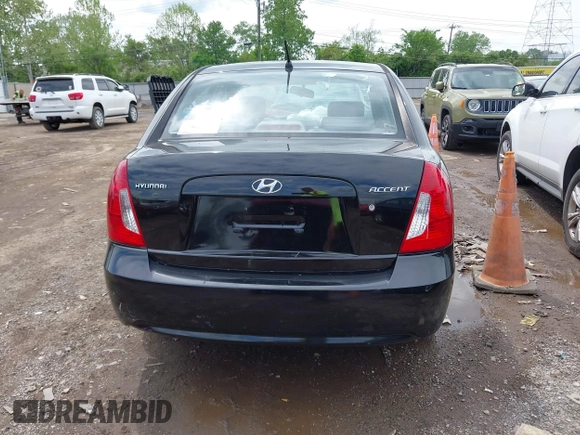 2006 Hyundai Accent GLS z VIN KMHCN46C76U038040, wystawiony jako IAAI lot #42220455 z przebiegiem 140 413 mil mil oraz . Historia ofert i sprzedaży dostępna na DreamBid. Obrazek 17.