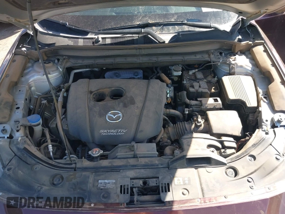 2019 Mazda CX-5 Sport with VIN JM3KFABM2K0686372, listed as a IAAI auction lot 41770183 with 57,202 mi miles and . Bid and sale history available at DreamBid. Image 10.