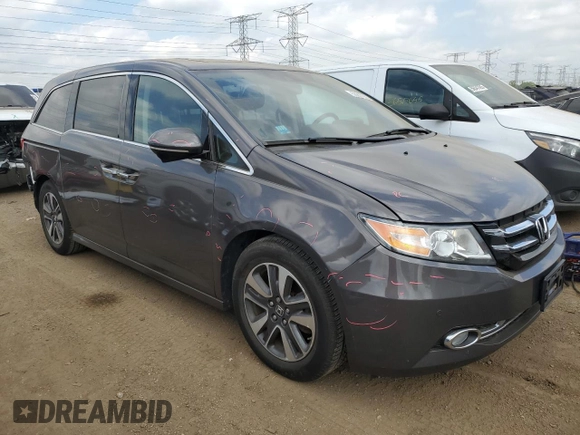 2015 Honda Odyssey Touring Elite z VIN 5FNRL5H96FB047204, wystawiony jako Copart lot #56297985 z przebiegiem 125 482 mil mil oraz Szkoda całkowita • Salvage title. Historia ofert i sprzedaży dostępna na DreamBid. Obrazek 4.