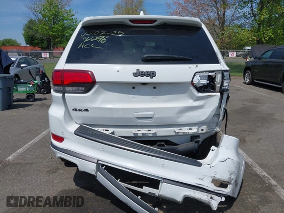 2021 Jeep Grand Cherokee Overland with VIN 1C4RJFCG6MC592296, listed as a IAAI auction lot 42170899 with 56,553 mi miles and . Bid and sale history available at DreamBid. Image 17.