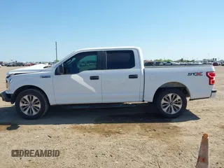 2018 Ford F-150 XL z VIN 1FTEW1CP7JKF56038, wystawiony jako IAAI lot #41999897 z przebiegiem 119 462 mil mil oraz . Historia ofert i sprzedaży dostępna na DreamBid. Obrazek 15.