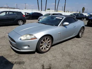 2007 Jaguar XK with VIN SAJDA44B975B03114, listed as a Copart auction lot 72181684 with 55,338 mi miles and Salvage Title. Bid and sale history available at carsss.com. Image 1.