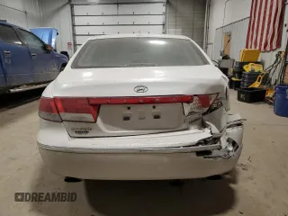 2009 Hyundai Azera Limited z VIN KMHFC46F09A372929, wystawiony jako Copart lot #88455705 z przebiegiem 111 222 mil mil oraz Szkoda całkowita • Salvage title. Historia ofert i sprzedaży dostępna na DreamBid. Obrazek 6.