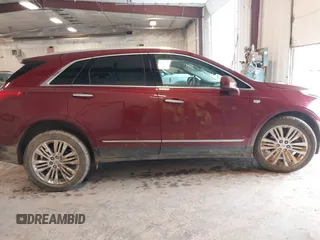 2018 Cadillac XT5 Premium Luxury AWD z VIN 1GYKNFRS6JZ114464, wystawiony jako IAAI lot #42320302 z przebiegiem 61 231 mil mil oraz . Historia ofert i sprzedaży dostępna na DreamBid. Obrazek 14.