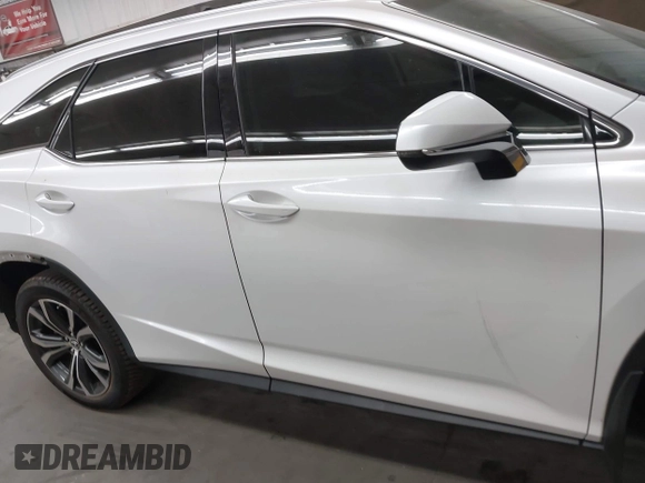 2018 Lexus RX 350L Premium z VIN JTJGZKCA3J2003885, wystawiony jako IAAI lot #42381977 z przebiegiem 76 823 mil mil oraz . Historia ofert i sprzedaży dostępna na DreamBid. Obrazek 14.