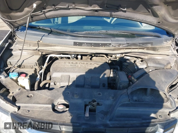2016 Honda Odyssey SE with VIN 5FNRL5H32GB089740, listed as a IAAI auction lot 41402635 with 120,666 mi miles and . Bid and sale history available at DreamBid. Image 10.