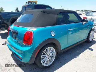 2017 MINI Convertible Cooper S z VIN WMWWG9C30H3C80917, wystawiony jako IAAI lot #42227320 z przebiegiem 38 490 mil mil oraz . Historia ofert i sprzedaży dostępna na DreamBid. Obrazek 4.