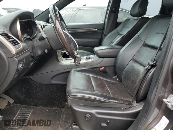 2014 Jeep Grand Cherokee Summit с VIN 1C4RJFJG6EC500348, выставлен на аукционе Copart как лот 59166275 с пробегом 104 623 миль миль и Списание • Salvage title. История ставок и продаж доступна на DreamBid. Изображение 7.