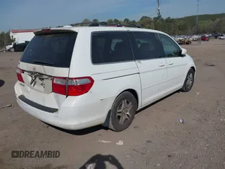 2006 Honda Odyssey EX-L z VIN 5FNRL387X6B452405, wystawiony jako IAAI lot #41884680 z przebiegiem 333 366 mil mil oraz . Historia ofert i sprzedaży dostępna na DreamBid. Obrazek 4.