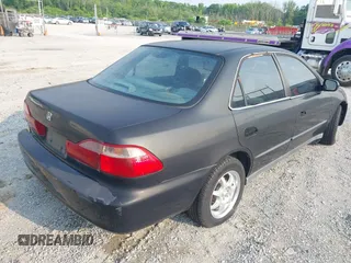 1999 Honda Accord LX z VIN 1HGCG5641XA008694, wystawiony jako IAAI lot #42385438 z przebiegiem 323 971 mil mil oraz . Historia ofert i sprzedaży dostępna na DreamBid. Obrazek 4.
