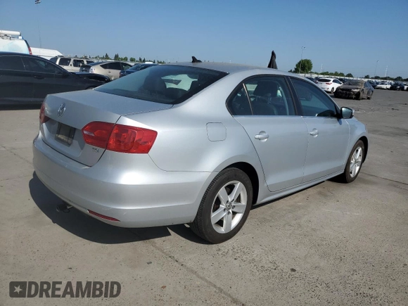 2012 Volkswagen Jetta TDI w/Premium & Nav with VIN 3VWLL7AJ8CM349006, listed as a Copart auction lot 54934995 with 110,596 mi miles and Salvage title. Bid and sale history available at DreamBid. Image 3.