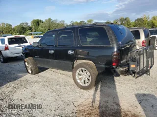 2002 GMC Yukon SLT with VIN 1GKEK13Z32R223491, listed as a Copart auction lot 69655684 with 210,705 mi miles and Salvage Title. Bid and sale history available at carsss.com. Image 2.