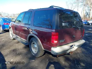 1998 Ford Expedition XLT z VIN 1FMFU18L5WLA05569, wystawiony jako IAAI lot #41683911 z przebiegiem 235 322 mil mil oraz . Historia ofert i sprzedaży dostępna na DreamBid. Obrazek 3.