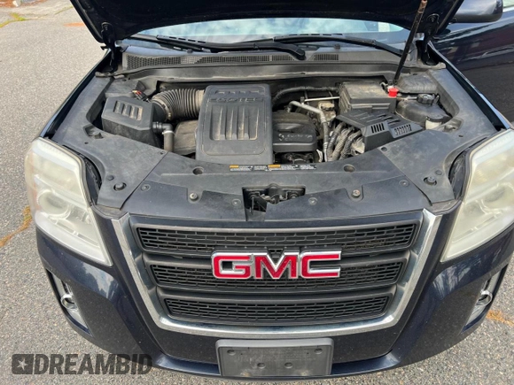 2015 GMC Terrain SLE z VIN 2GKFLVEK6F6144259, wystawiony jako Copart lot #61505395 z przebiegiem 169 995 mil mil oraz Czysty tytuł • Clean title. Historia ofert i sprzedaży dostępna na DreamBid. Obrazek 7.
